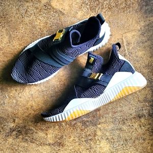 PUMA Defy Mid Athletic Slip On Tennis Shoe